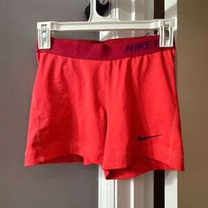 Nike Pink-Red Women’s Athletic Shorts with Navy Logo